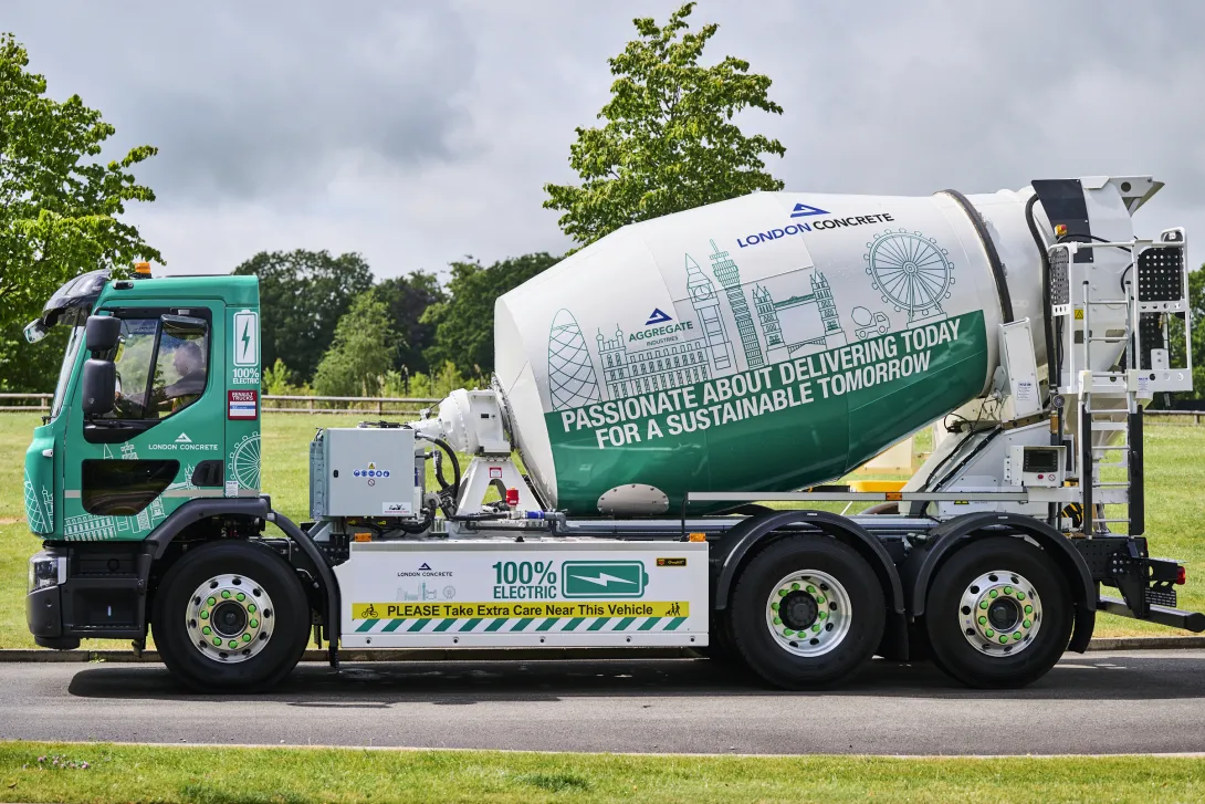 A side on view of an electrically powered concrete mixer with London Concrete branding on. It will be the first e-mixer to operate in London.