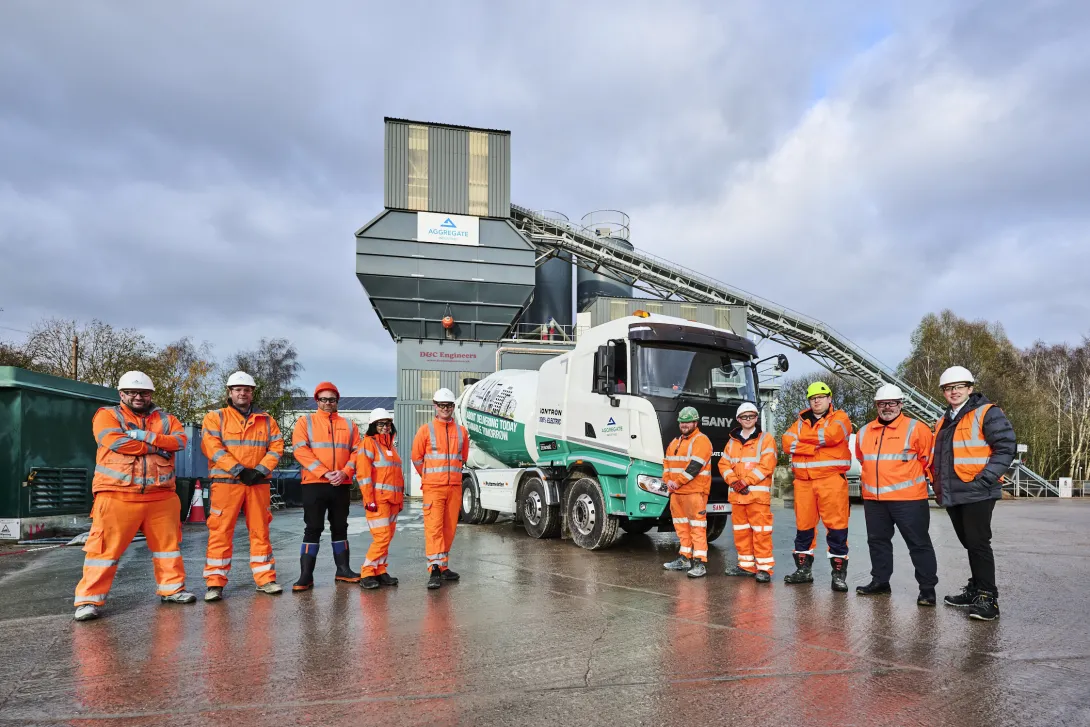 The new Sany Putzmeister emixer truck at Coleshill Readymix plant with representatives from Aggregate Industries, Putzmeister and Zenobe