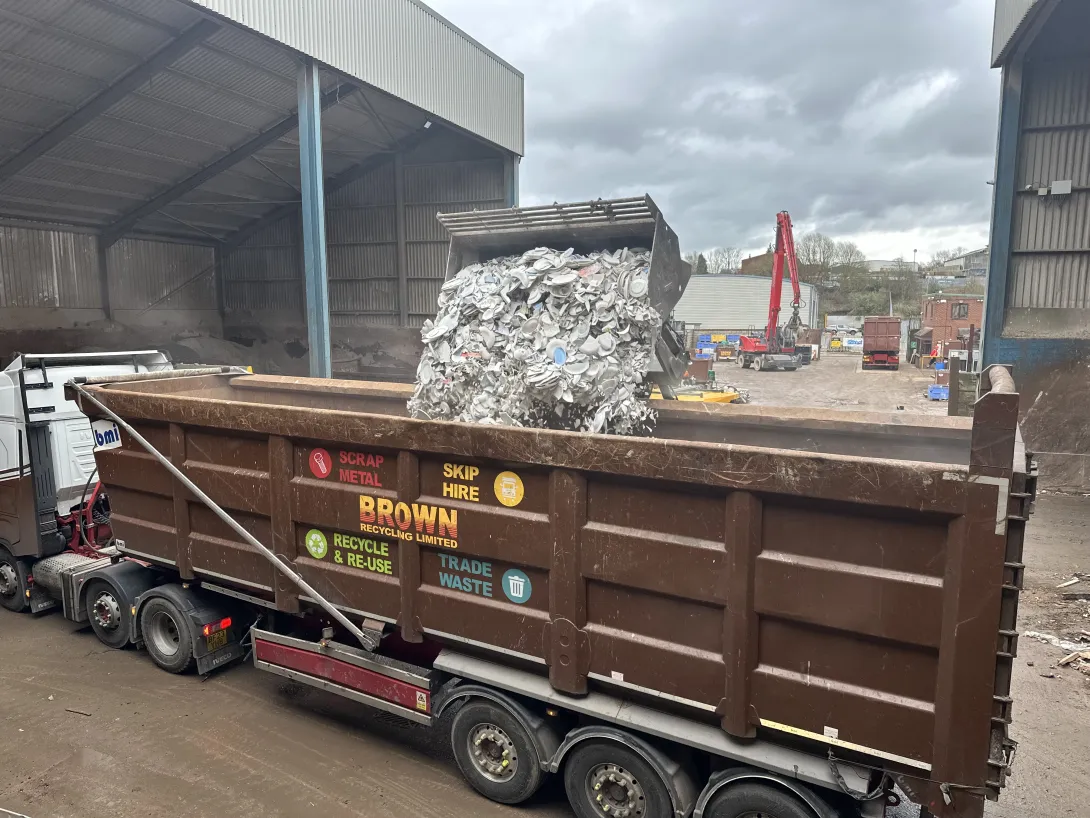 Pitcher waste- broken and rejected pottery- being loaded into a Brown Recycling truck to be delivered to Cauldon to use in the cement production process.